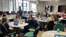 A group of students attending a PSLG session
